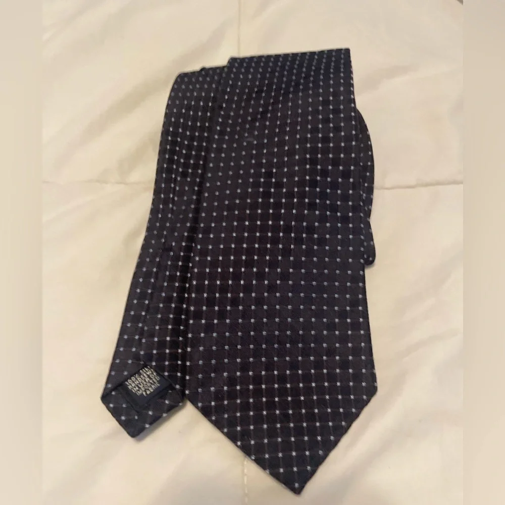 Sharp Navy Lands End 100% silk tie with white hand tied dots.